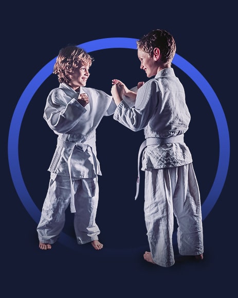 //actionkarate.net/wp-content/uploads/2024/07/two-boys-training-martial-arts-min.jpg